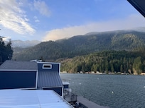 No better way to wake up - mountains, clouds and sunrays