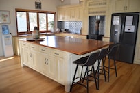 Amazing kitchen bench, so much room for everyone.