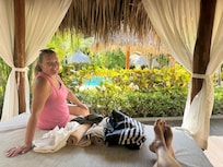Taking advantage of one of the outdoor sun beds near the pool.