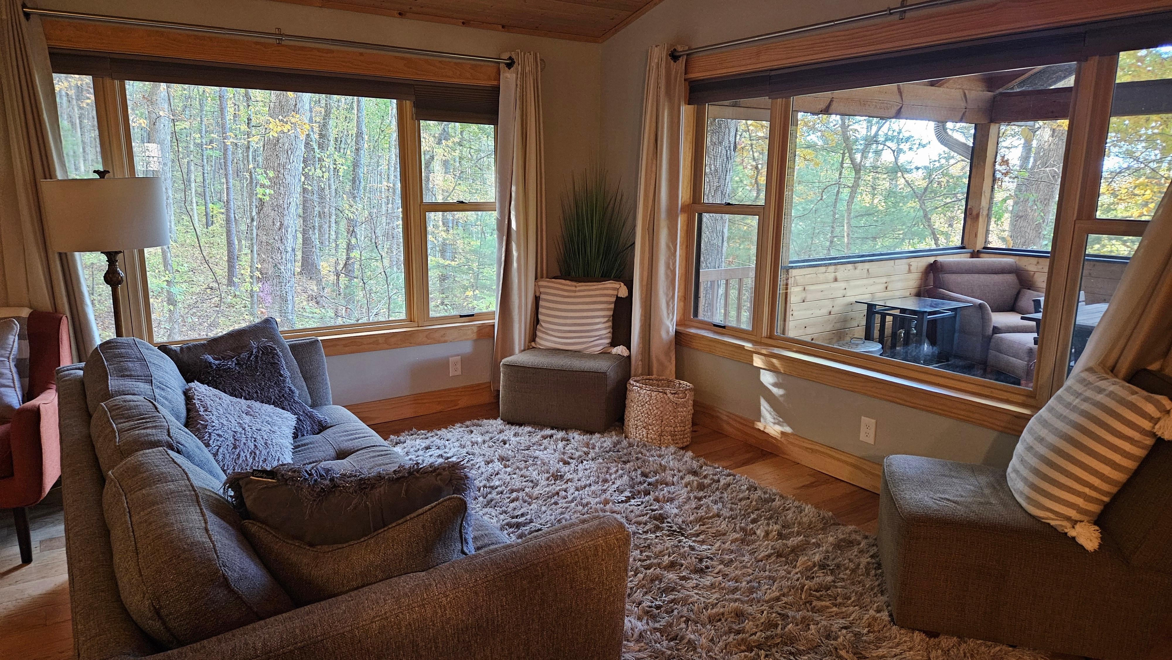 Comfy sitting area with large windows for peaceful views