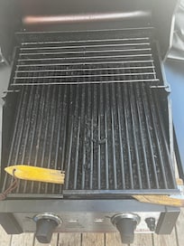 Grill grates need replacing or a thorough deep clean. And new grill brush.