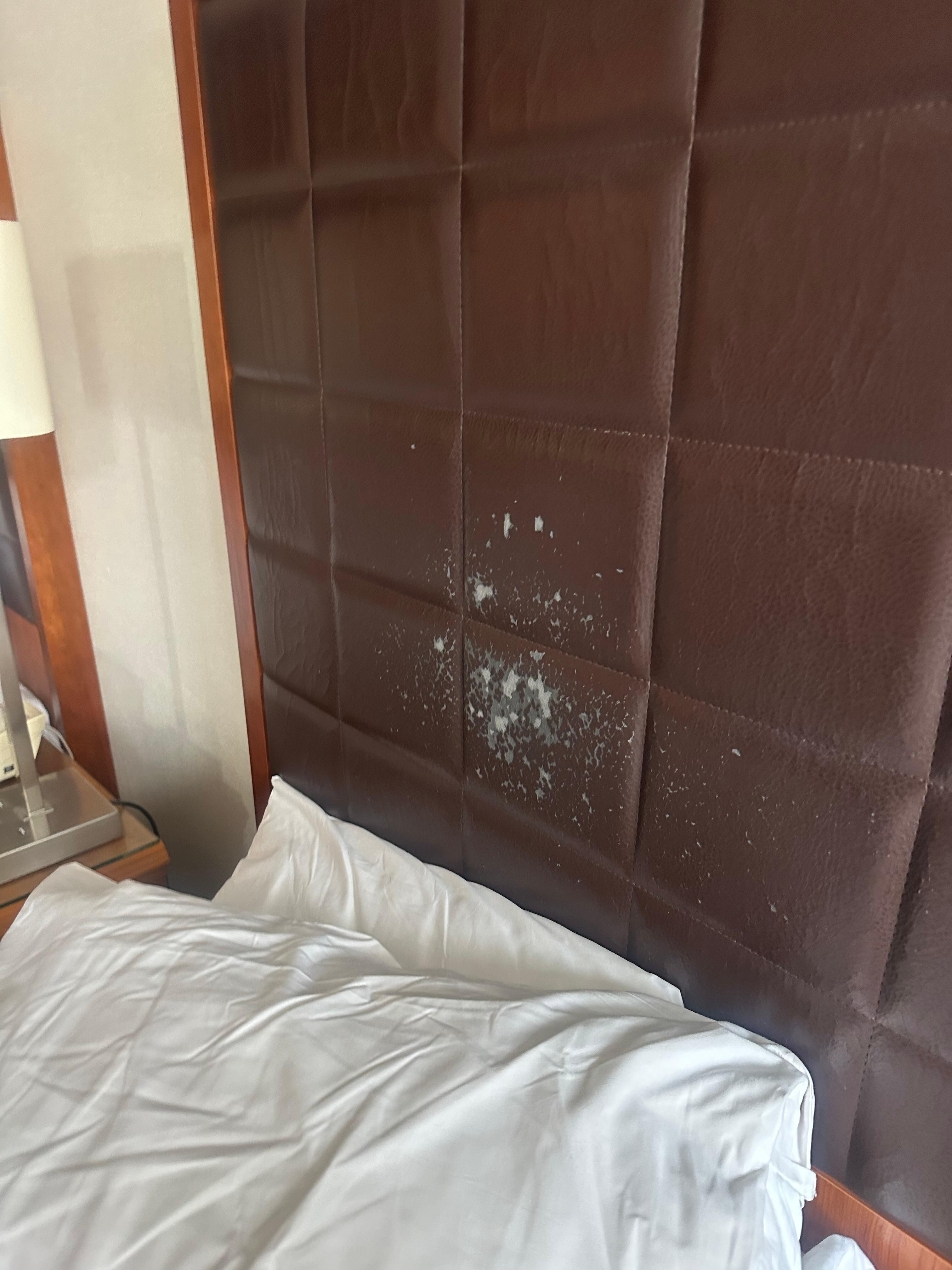 Shabby headboard - rest of room in much the same state 