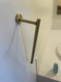 Broken tile, racks and bathrooms