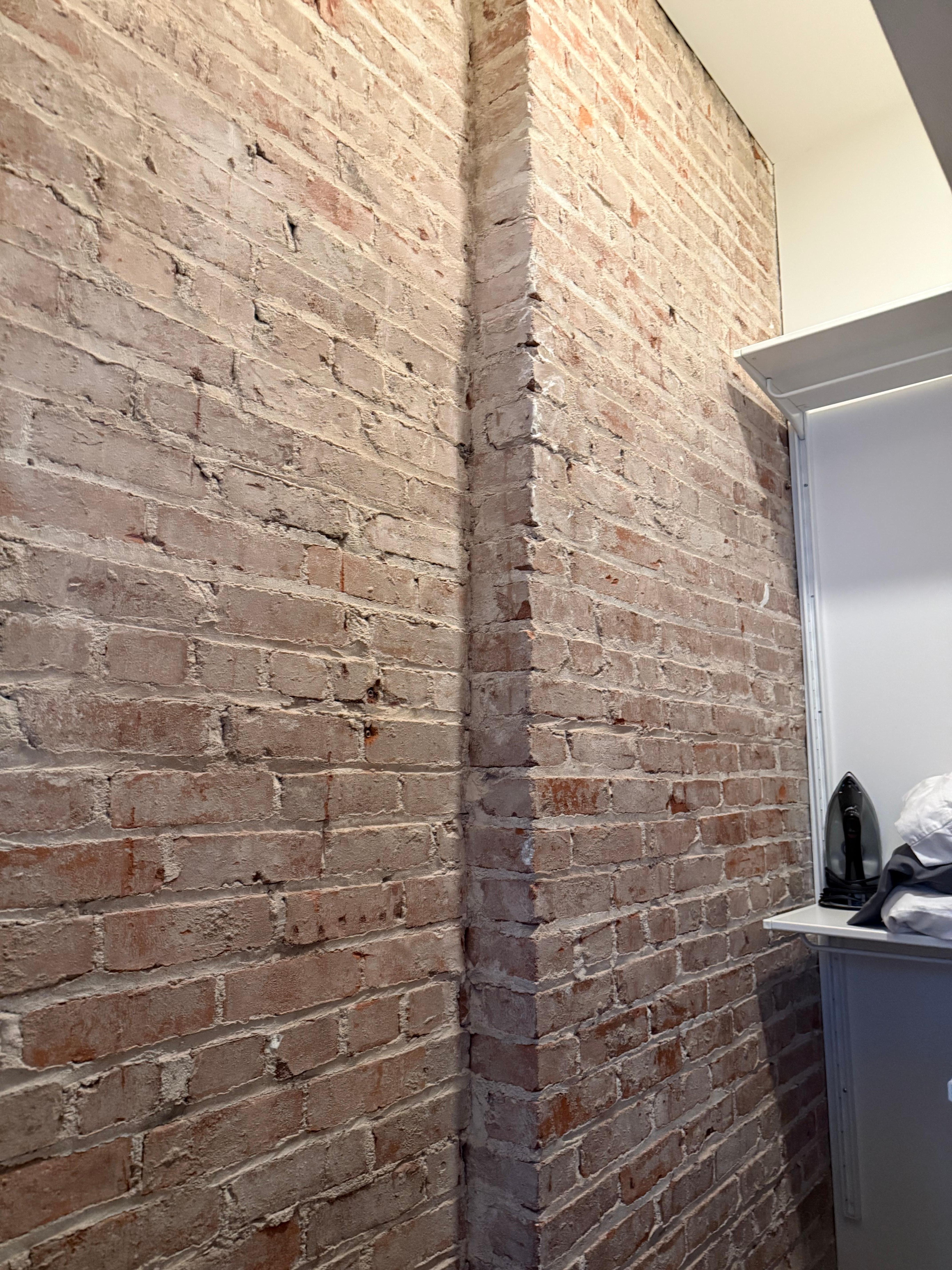 Loved the brick in the closet!