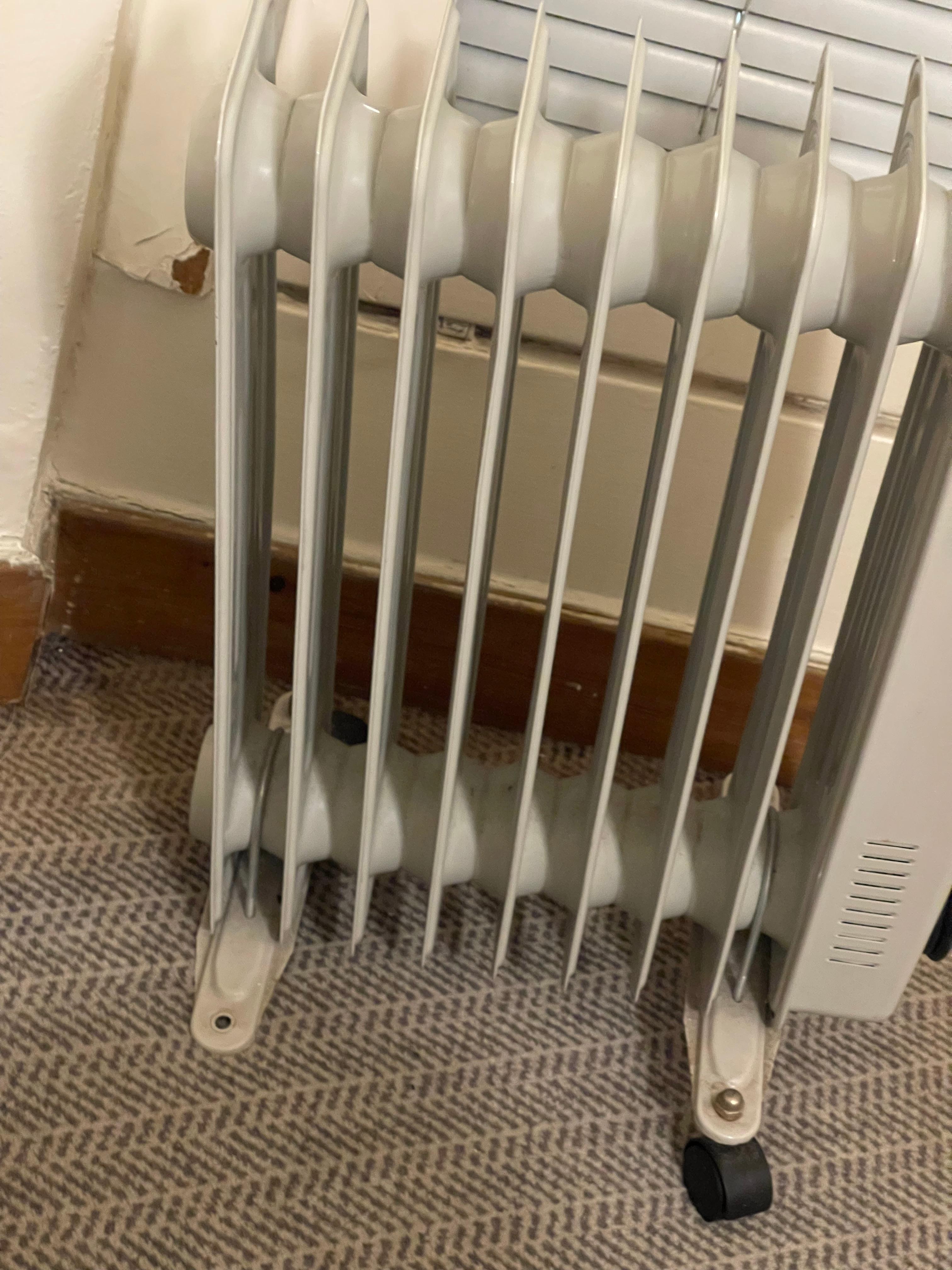 Heater a fire hazard as it could tip over with wheel missing