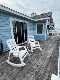This house had three floors outside decks and only two chairs. Where's everyone to sit?
