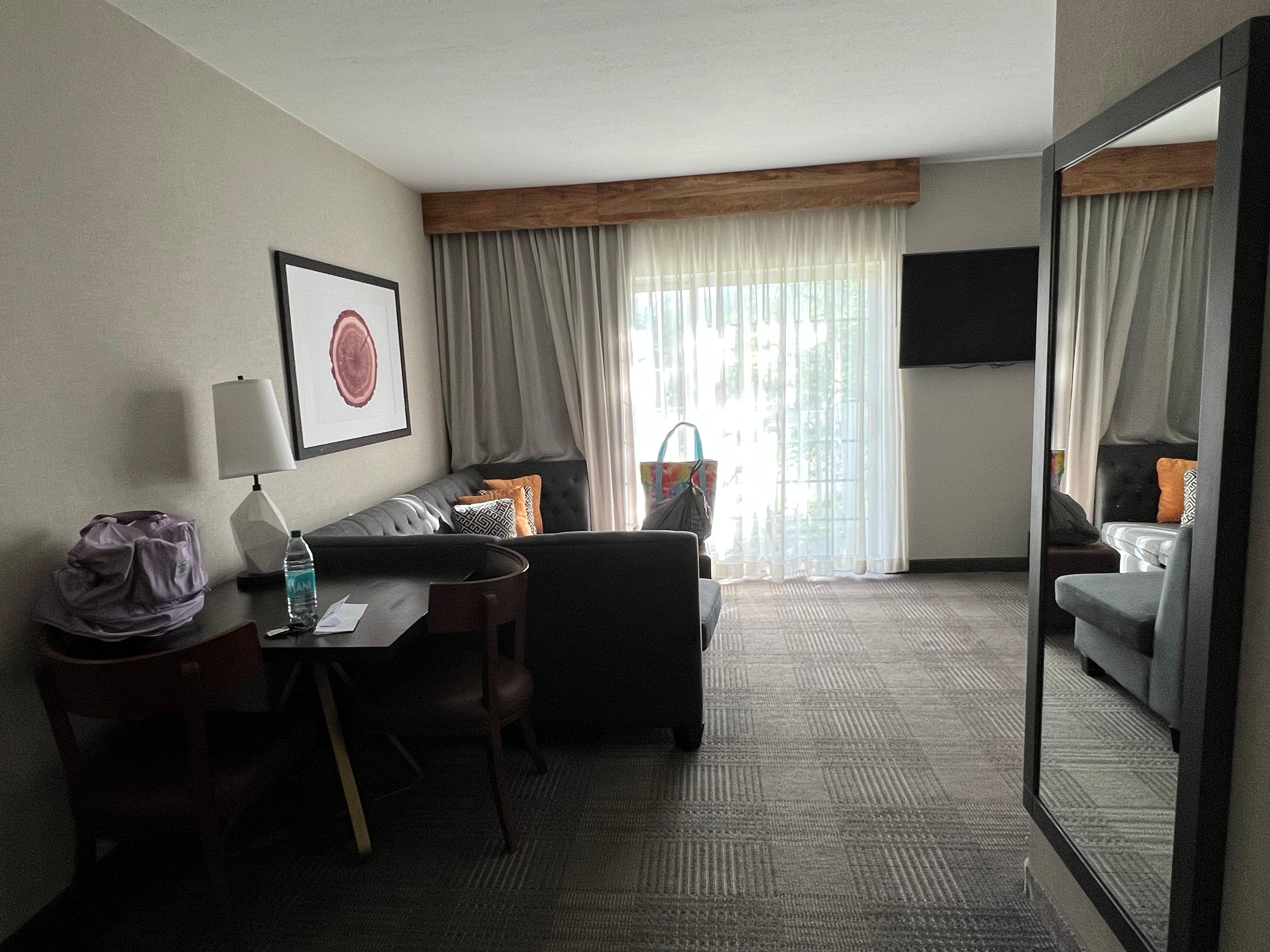 Entry to sitting area also work desk; coffee maker to the left