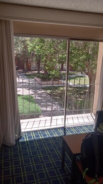 Sliding door to courtyard opens.