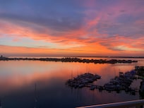 Breathtaking sunset views from a spacious balcony.