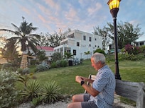 Waiting for sunset in the side yard.