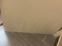 There was liquid that was old and stuck on the walls. Never been wiped