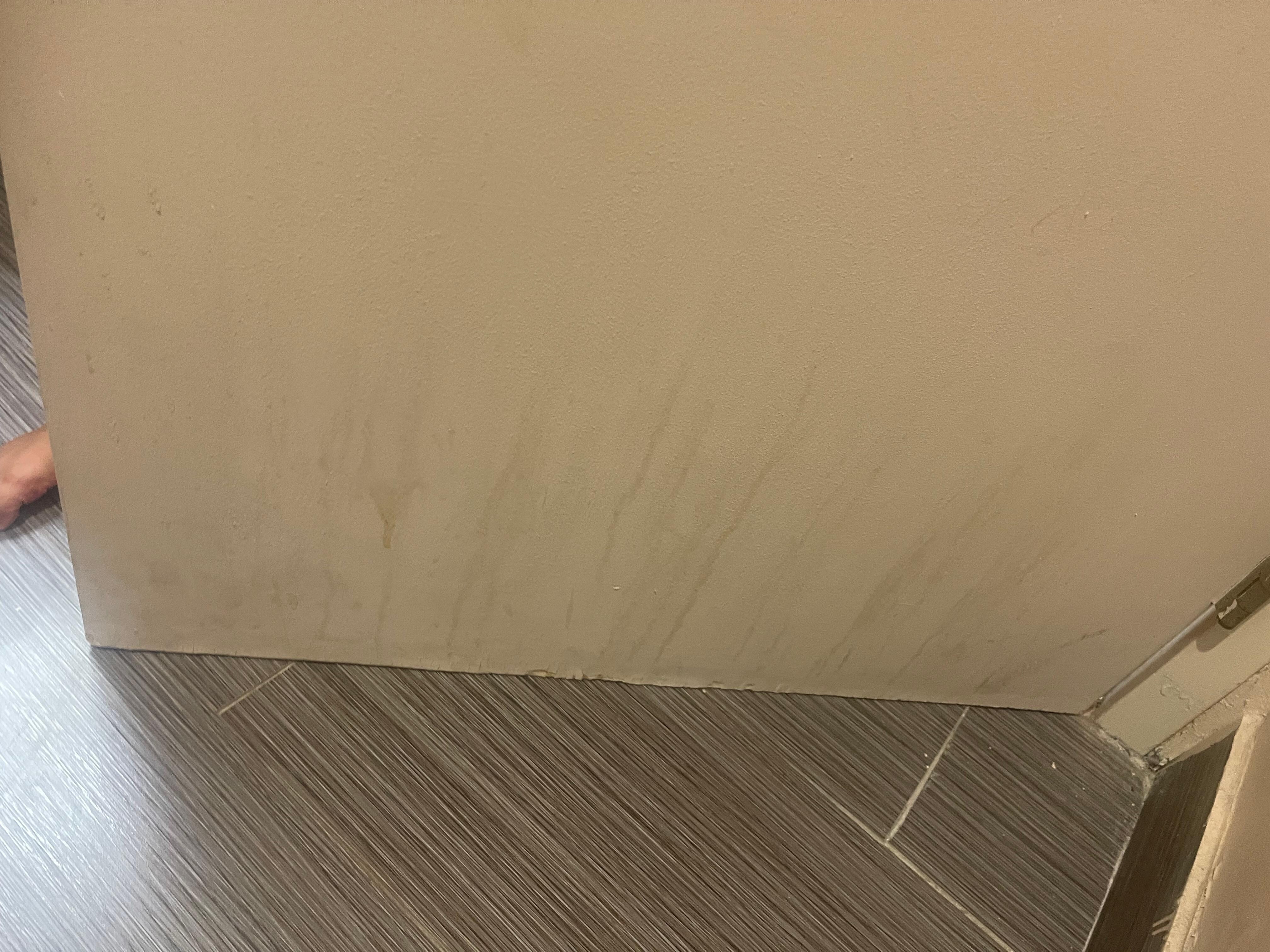 There was liquid that was old and stuck on the walls. Never been wiped