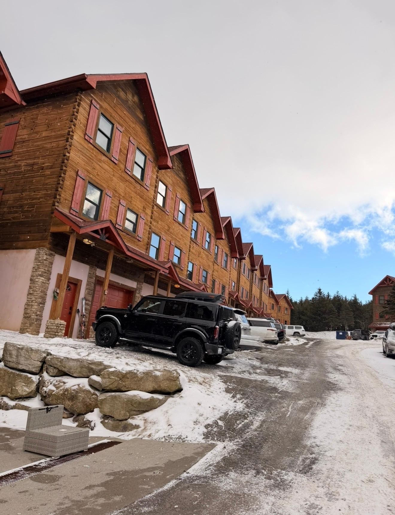 End Unit with 2 parking spots in front.