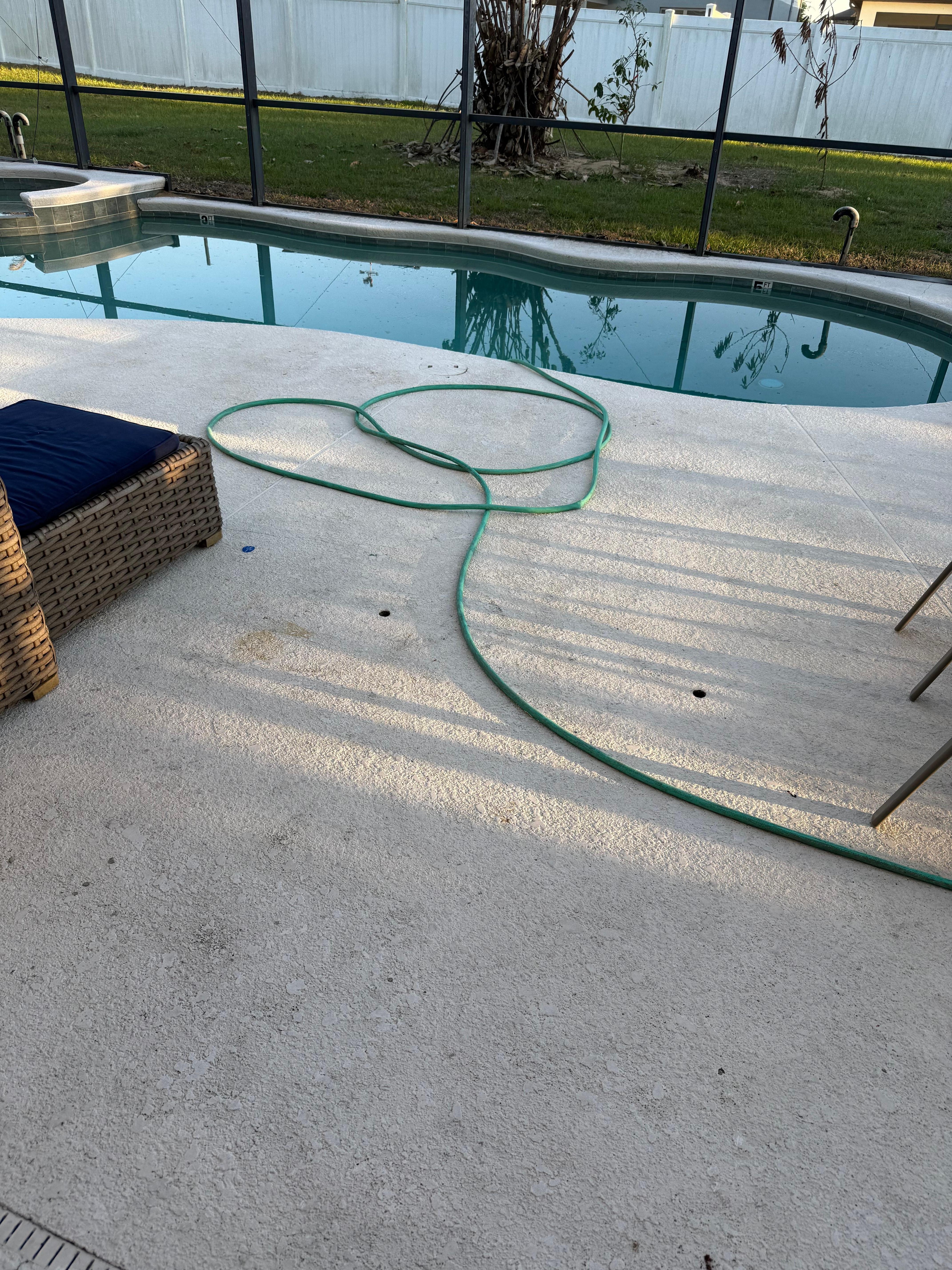 Hose across lanai in pool