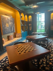 Cozy library with vintage books, warm lighting and hand-picked decor