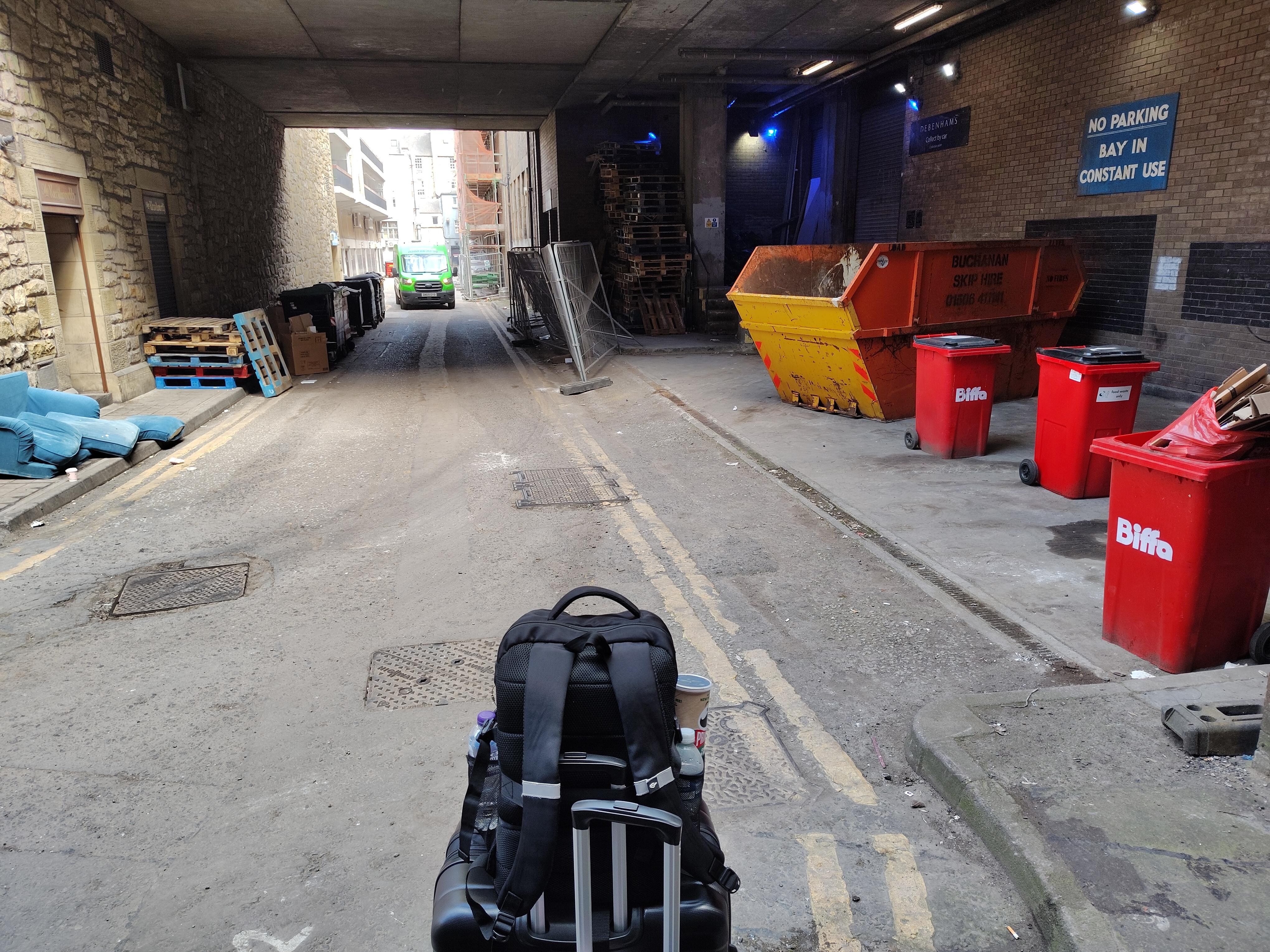 1.	Located in an alley with lots of homeless people hanging around 
