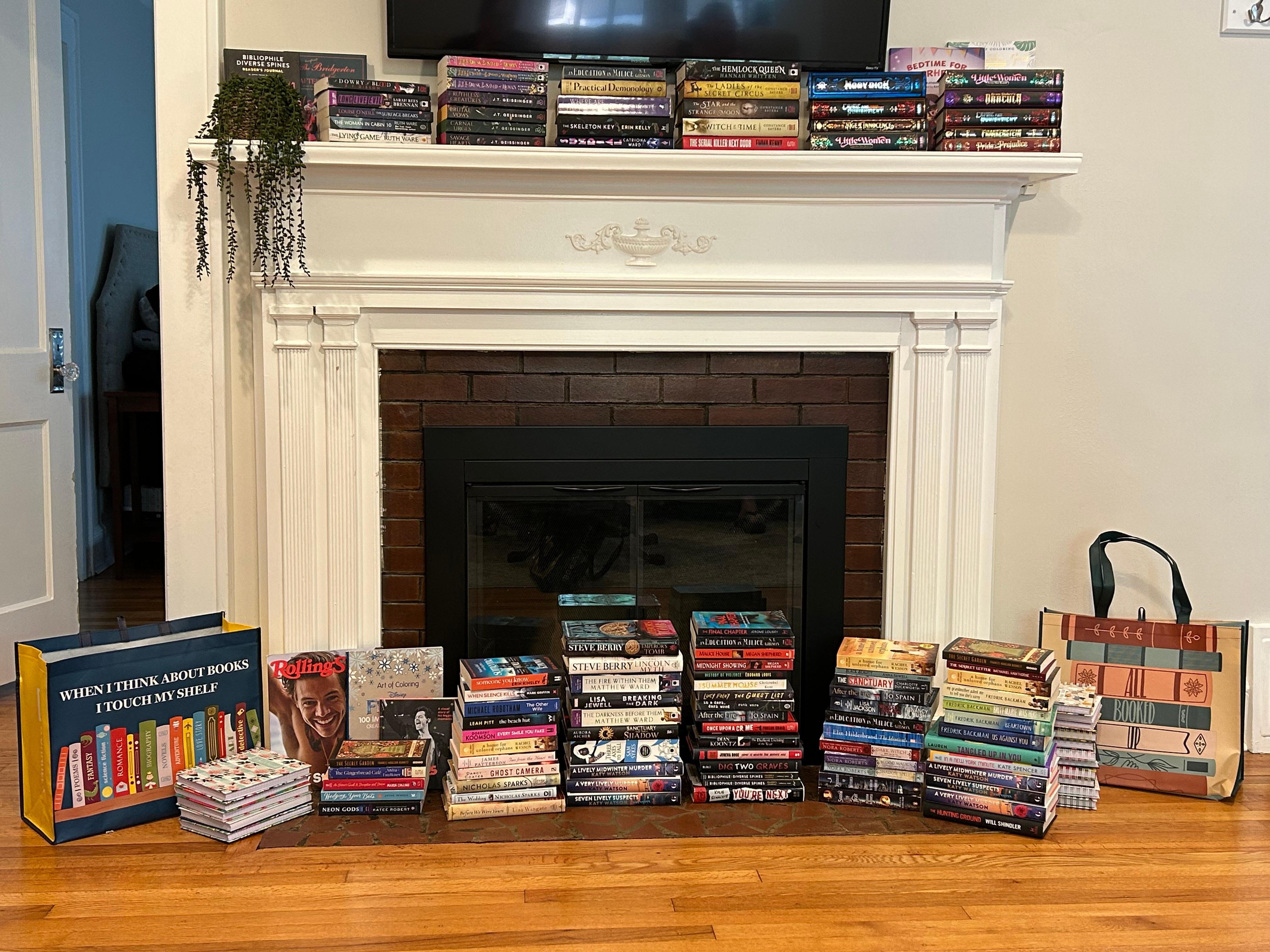 The fireplace made the perfect backdrop for our weekend book haul. Happy reading!