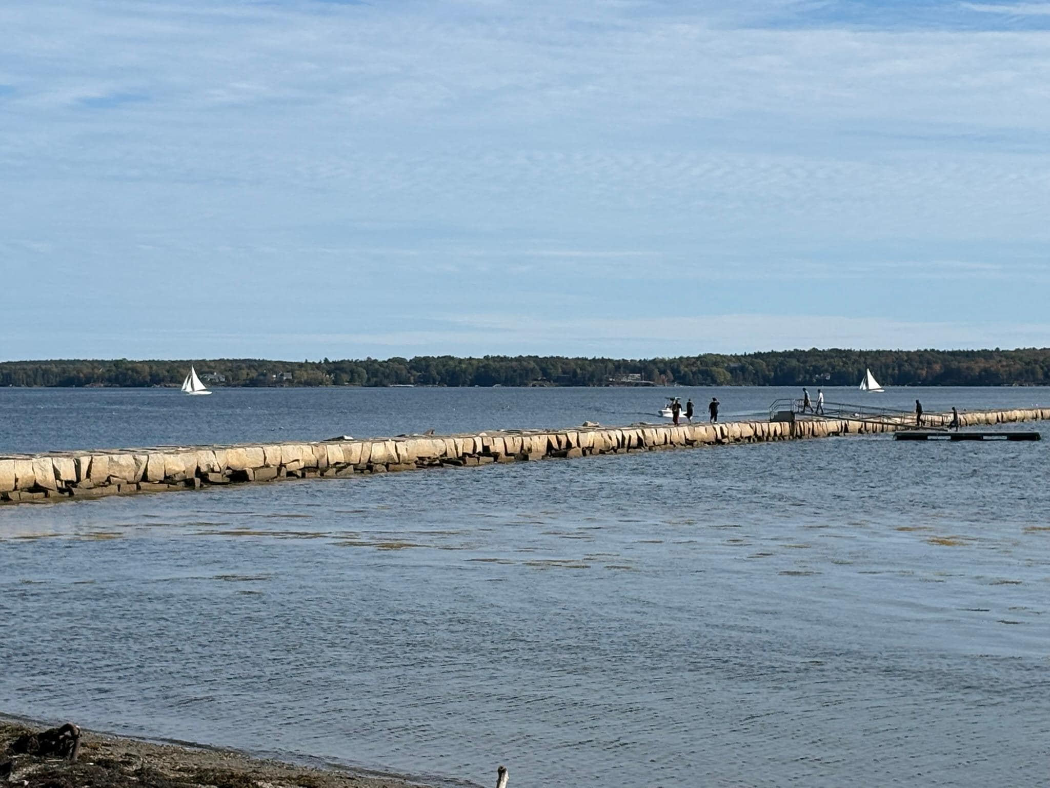 Walking the breakwater to the lighthouse