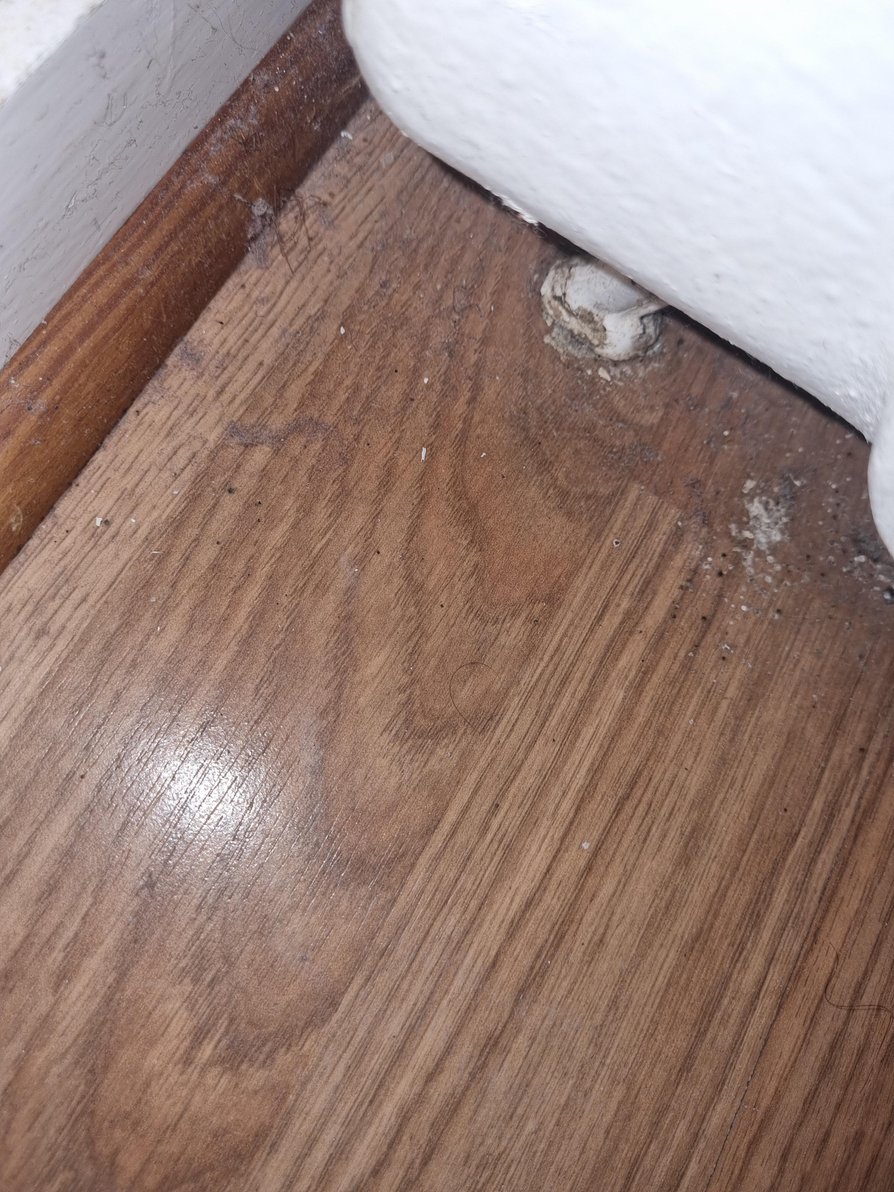 Dirty floor by radiator