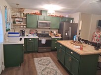 Kitchen, has all the dishes pots and pan. Has a crickpot and even has a Keurig !!