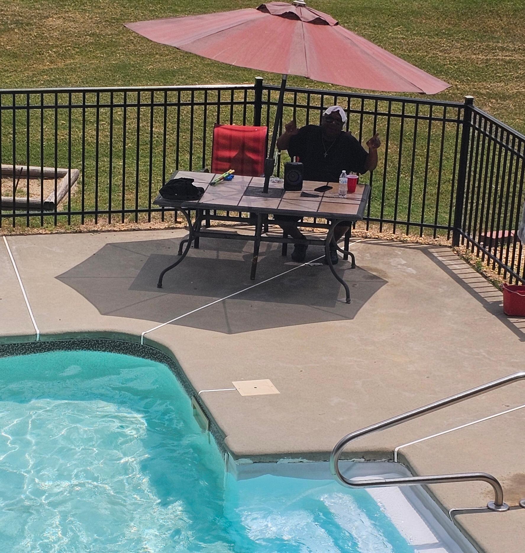 Pop Pop on lifeguard duty with the grands.