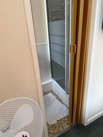 Looking into toilet seeing the shower door would not close properly