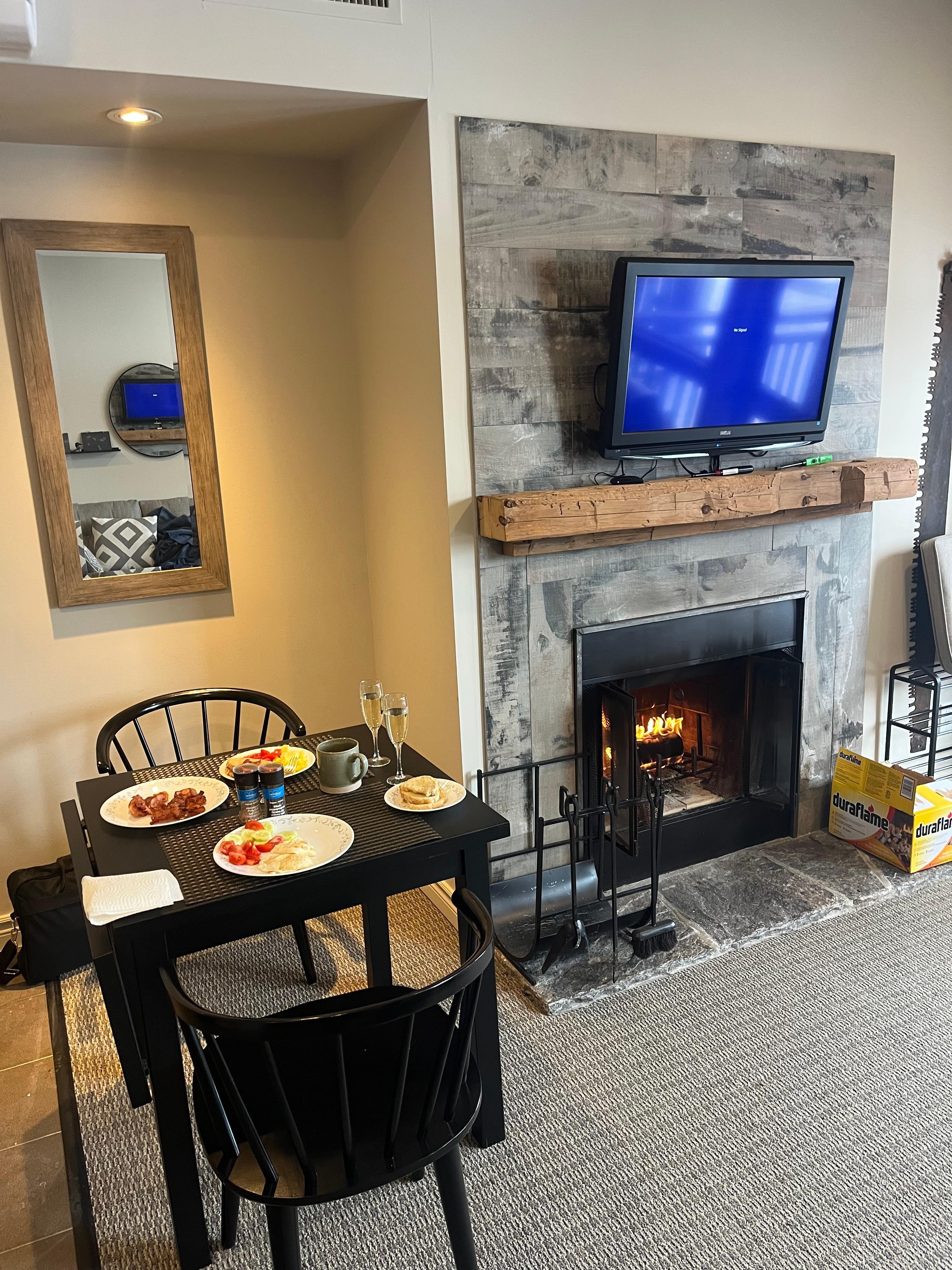 Great space to make a meal and enjoy eating by the fire