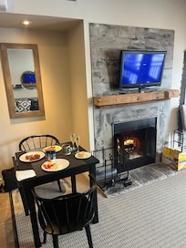 Great space to make a meal and enjoy eating by the fire