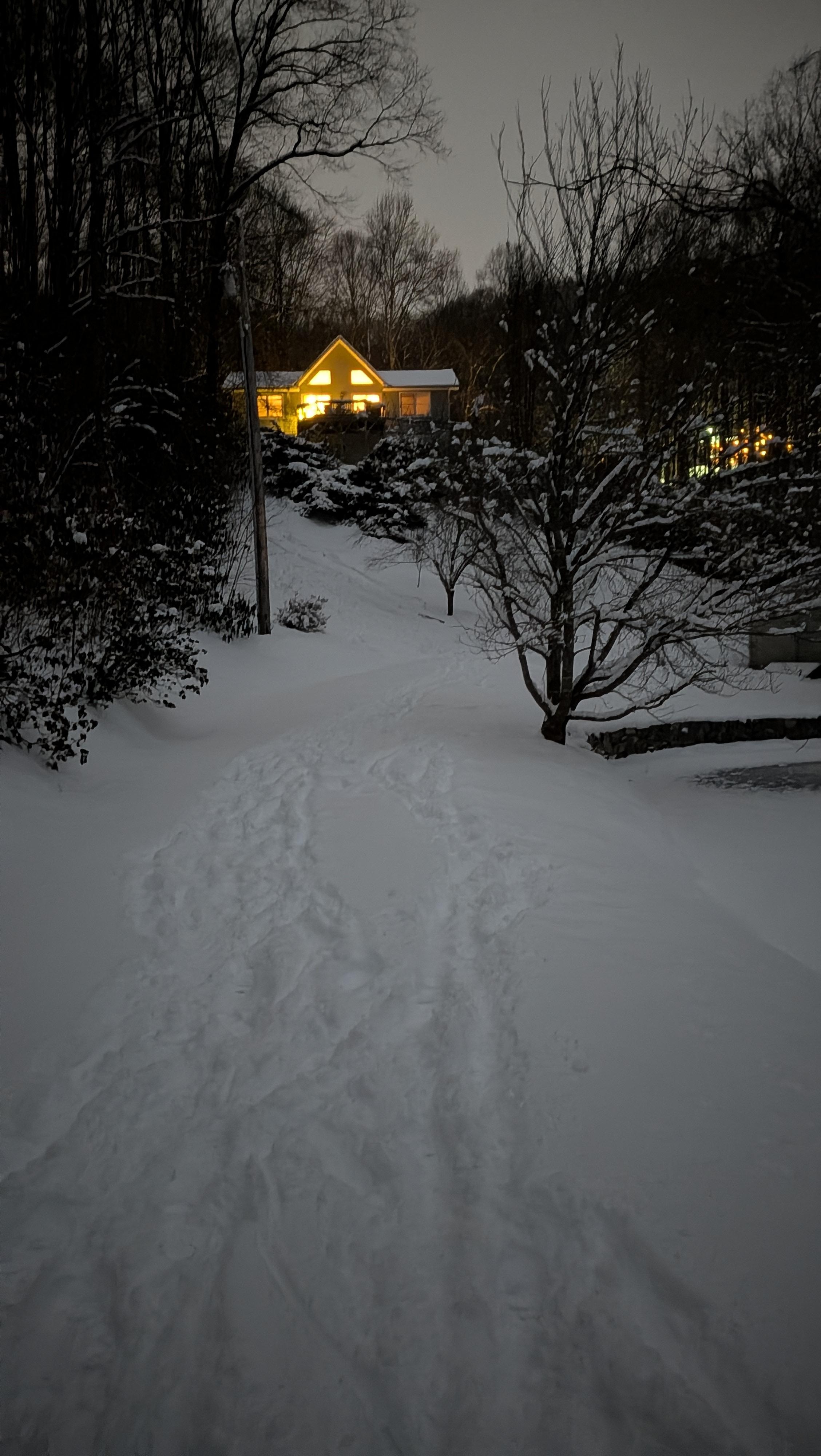We parked at the bottom of the driveway due to snowstorm. Driveway is narrow and hilly but goes directly to house entrance if not snowing. 
