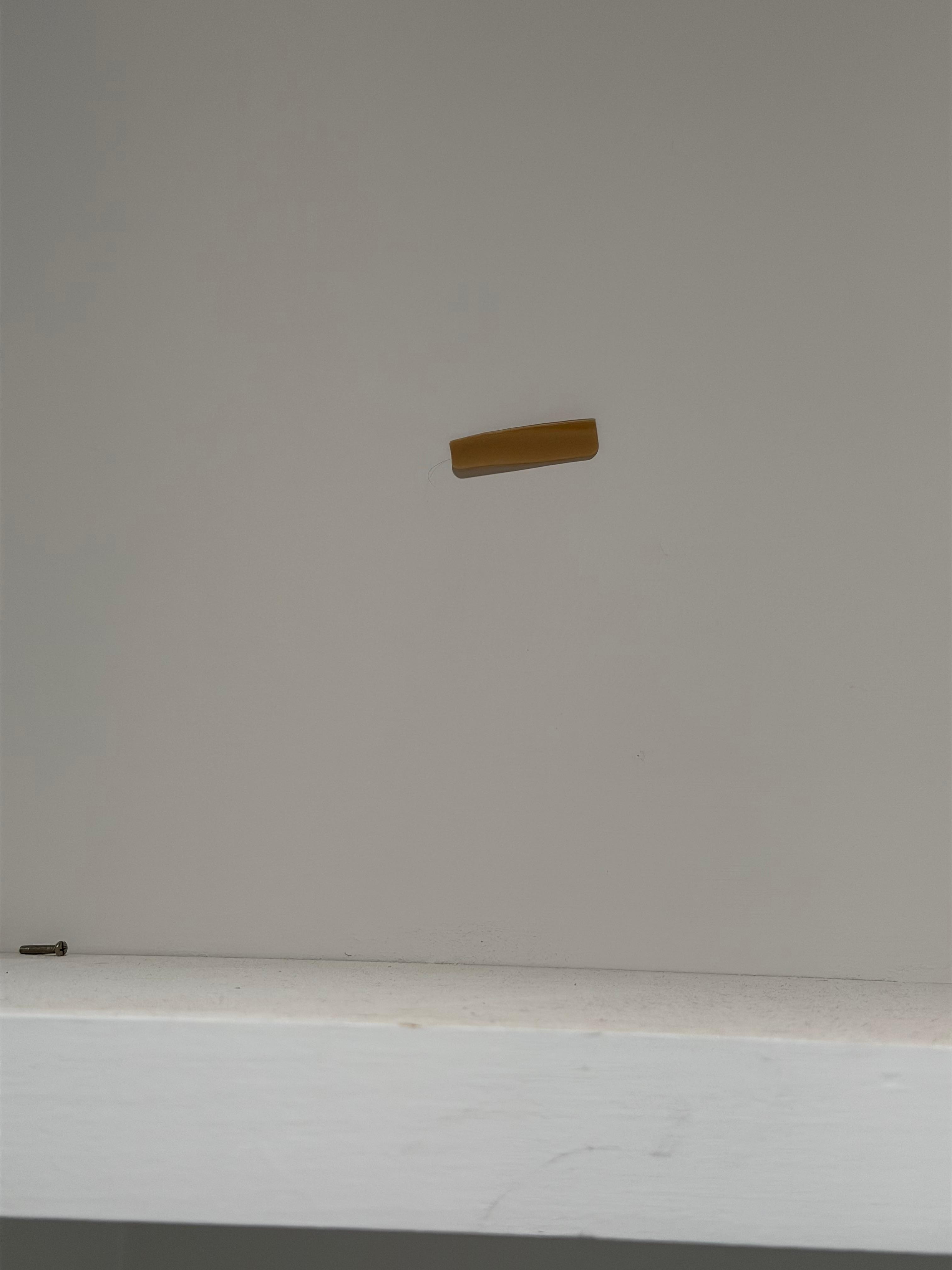 Creepy Band-Aid on the wall of the closet