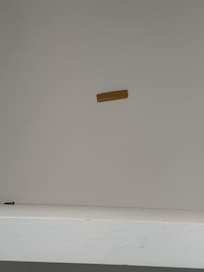 Creepy Band-Aid on the wall of the closet