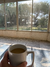 Listening to the waves with morning coffee