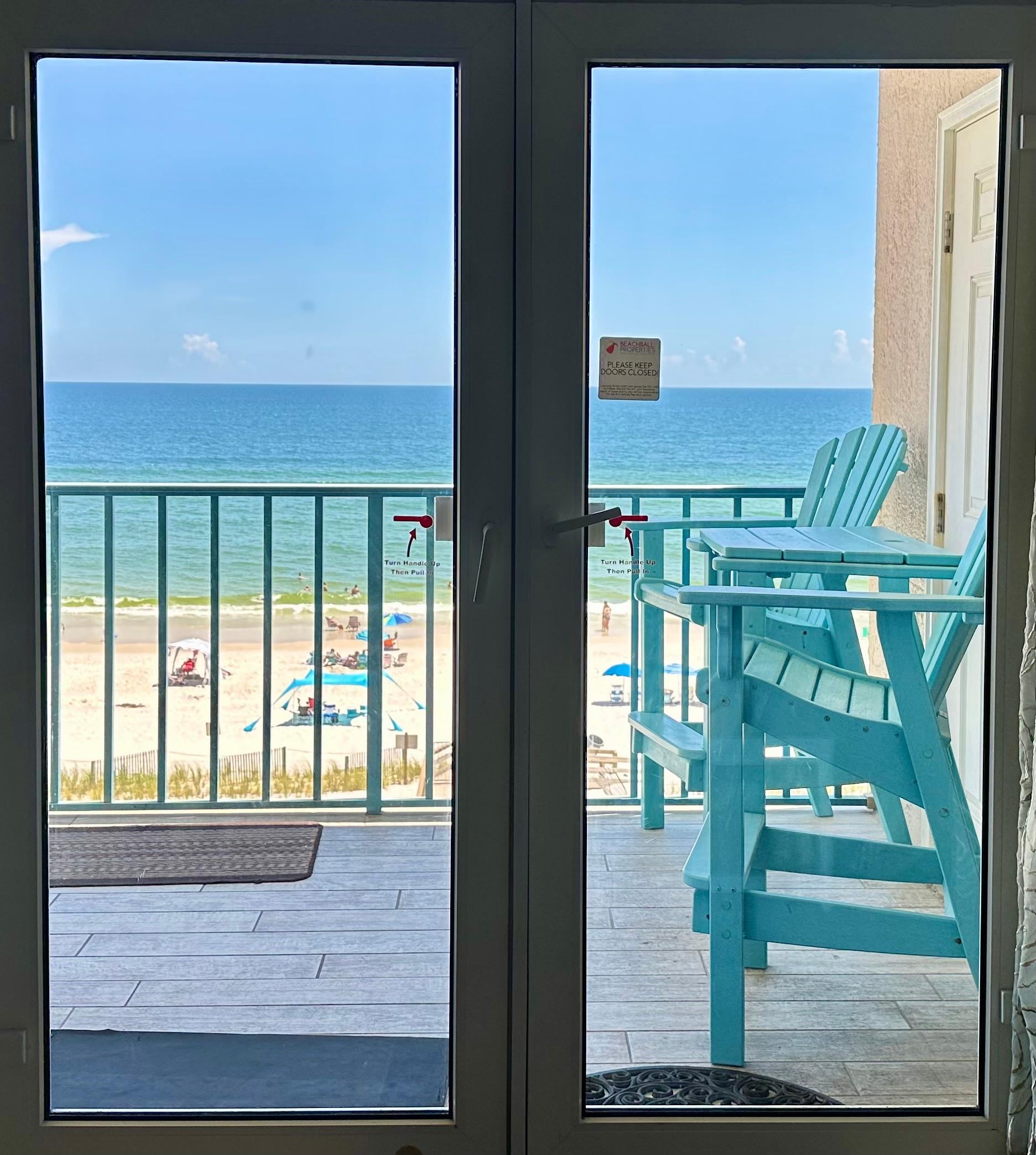 View from inside the condo overlooking the beach.