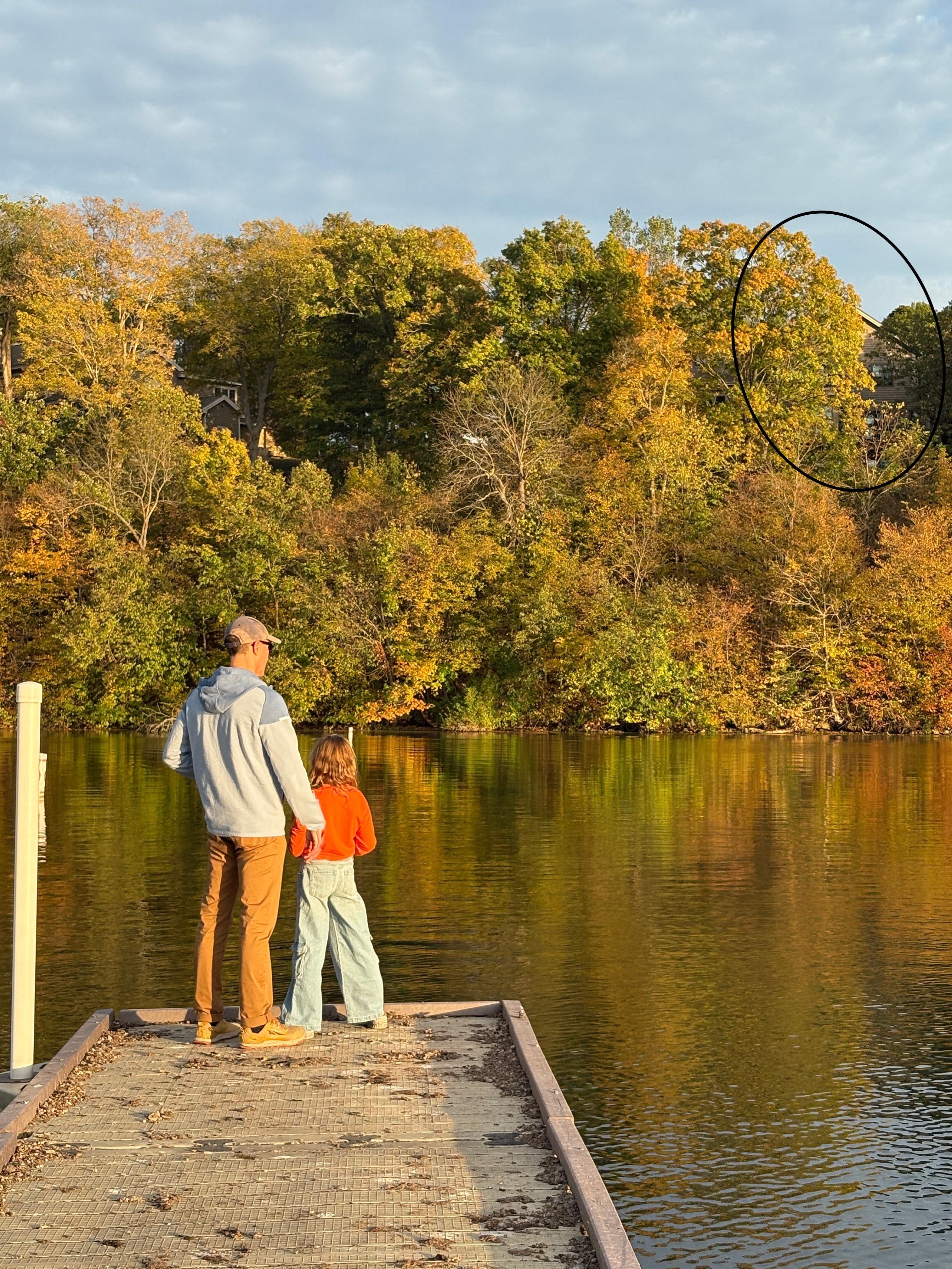 The house is circled.Fishing at marina.