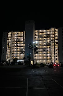 Backside of the building us just as beautiful as the front, and parking lot gates locked at midnight for vehicle safety.