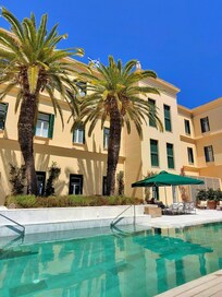 The pool area at the back of the hotel.