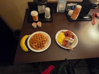 Eatting breakfast in the room I booked because the area of which we're meant to enjoy said breakfast
No one is welcome to,.....here a photo of what I believe is a normal amount of food for an adult.