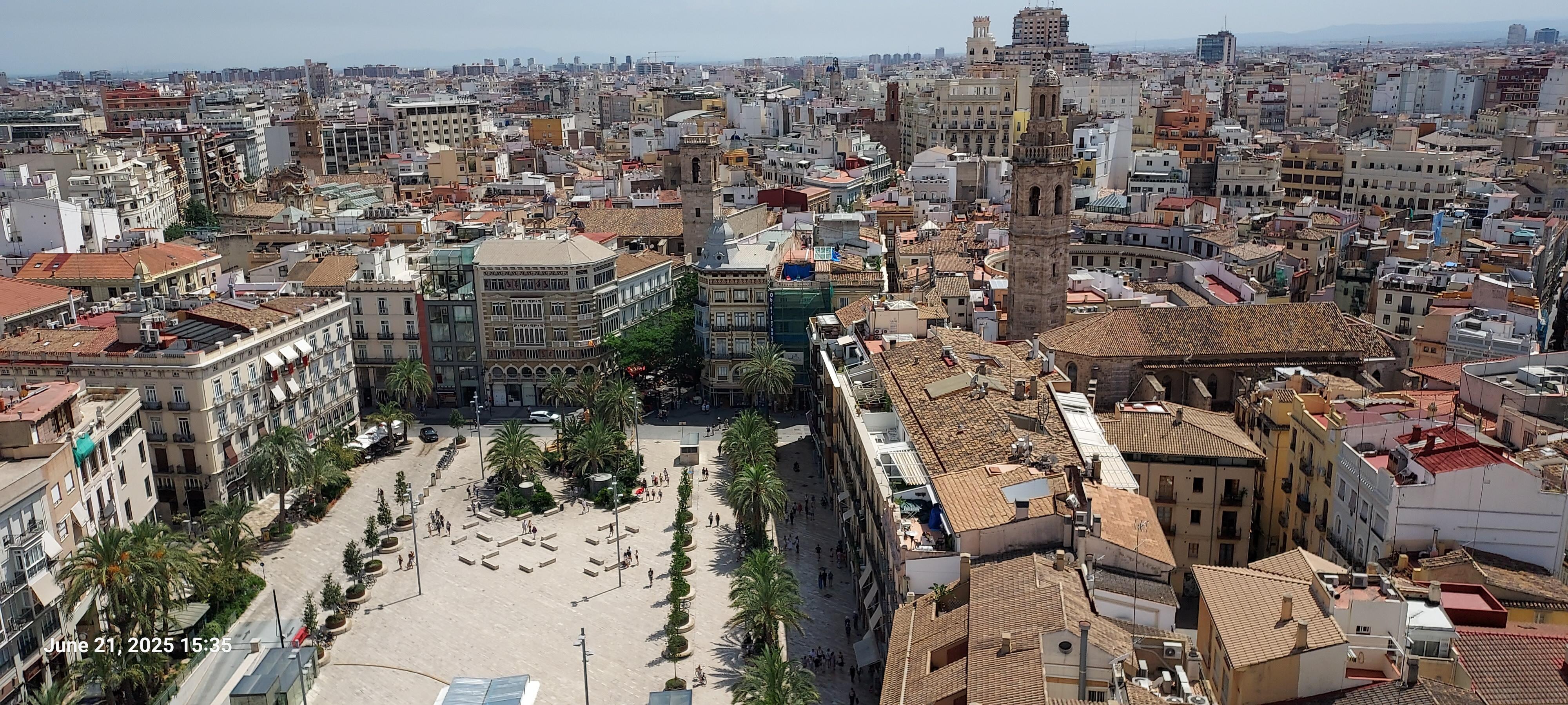 La Plaza del Reina, hotel is right next to the tower just off center. 