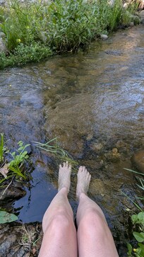 Soaking my feet in the creek was quite refreshing.
