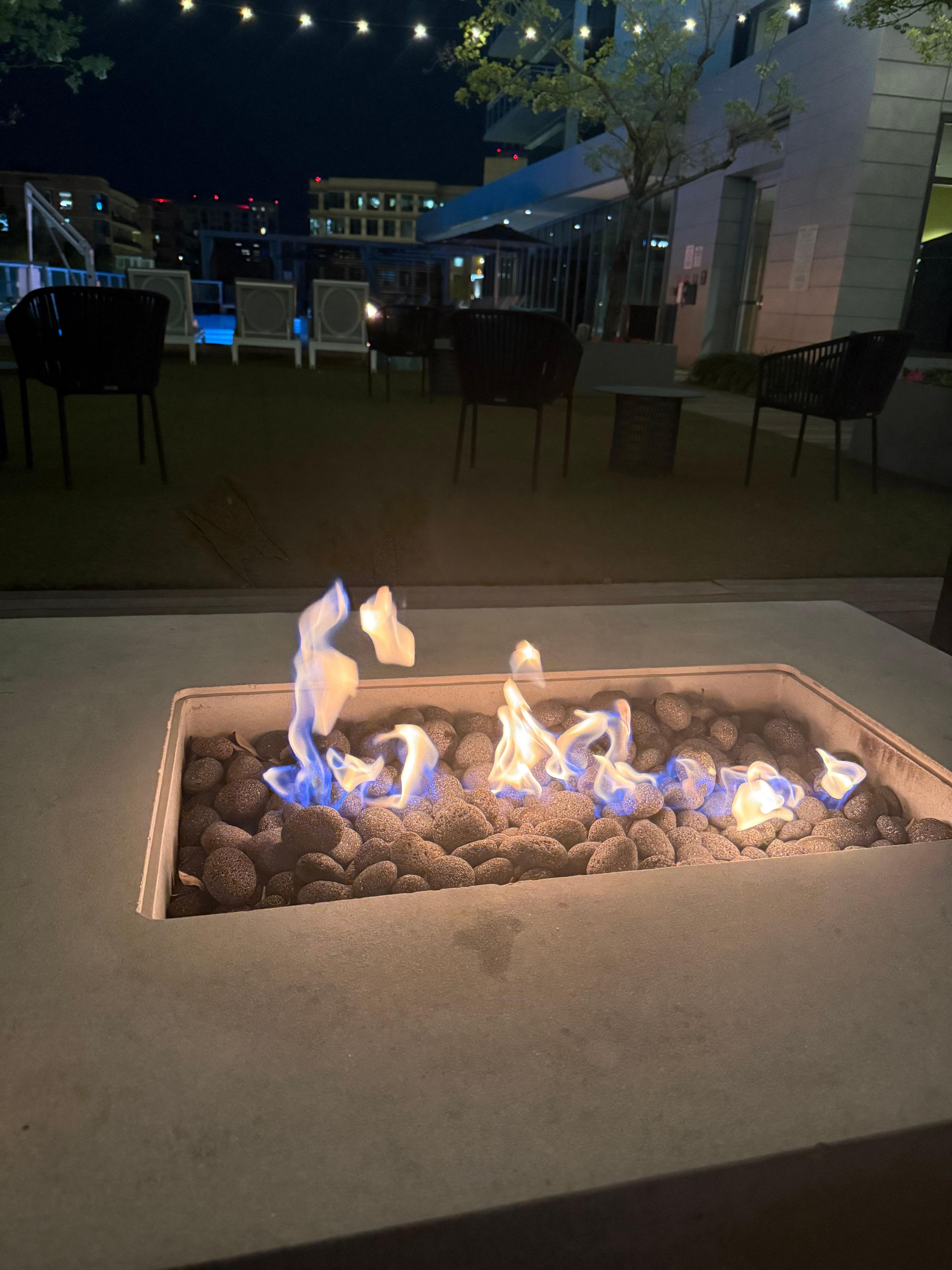 Poolside fire pit. You could hear the music from inside. So relaxing