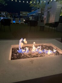 Poolside fire pit. You could hear the music from inside. So relaxing