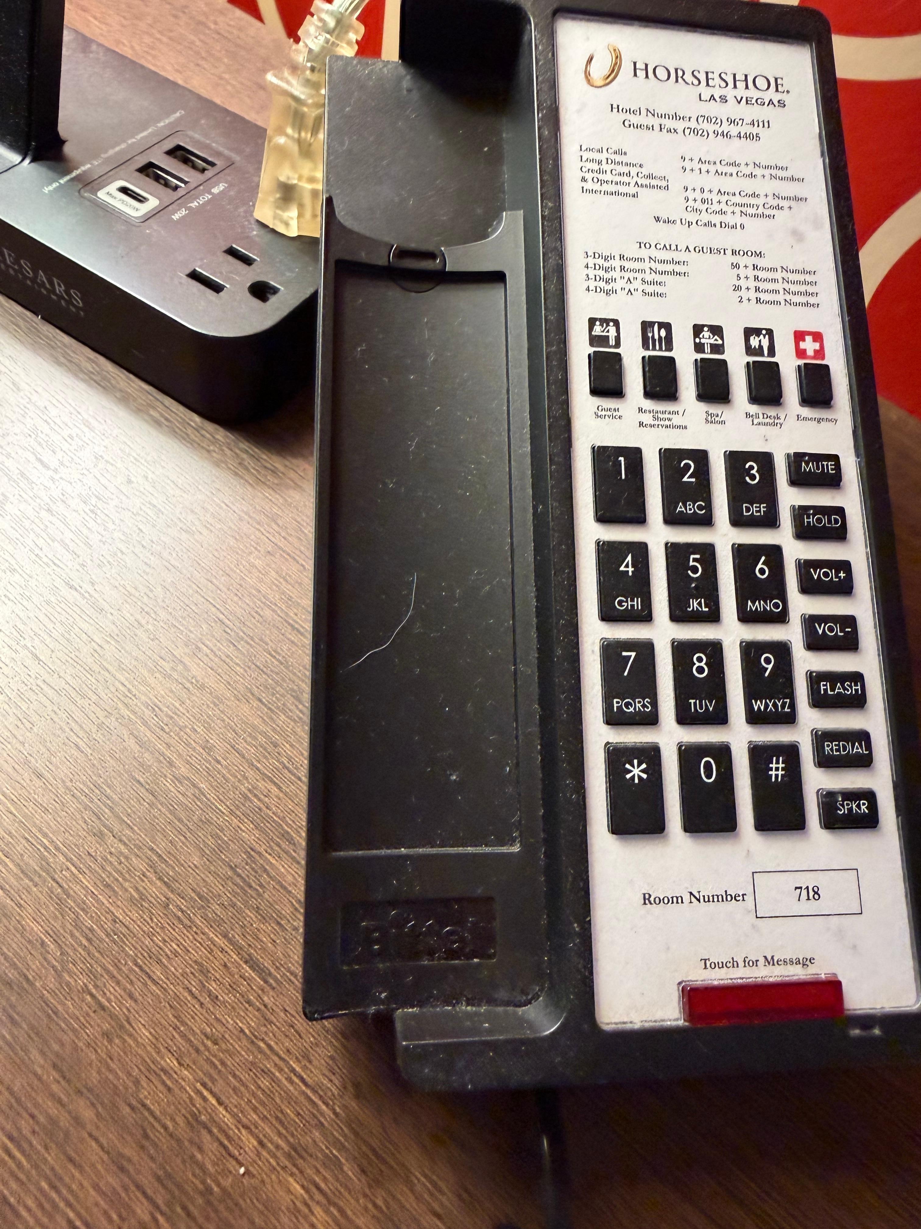 Nasty white hair and dust on telephone. Gross. 