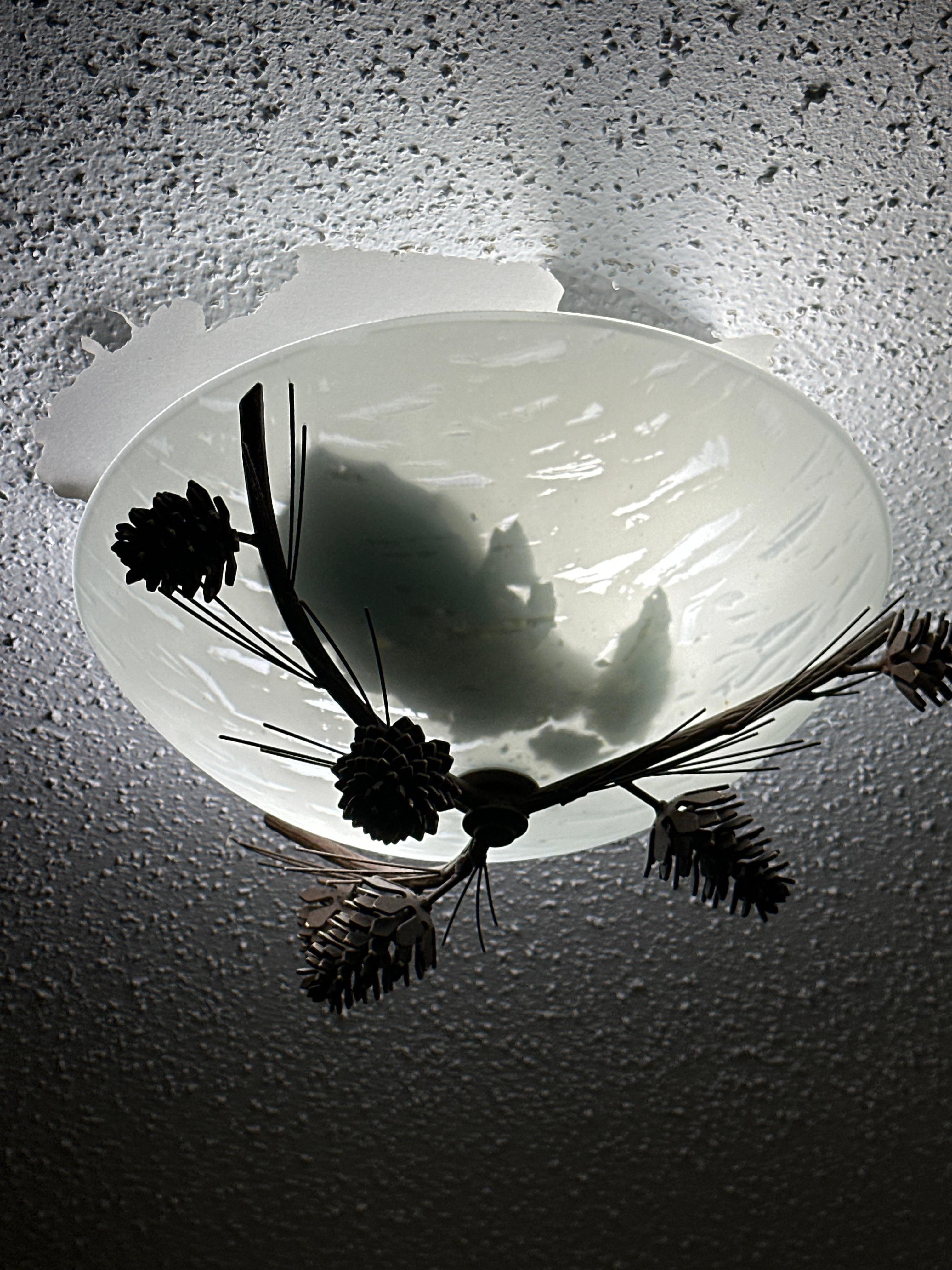 Poocorn ceiling peeling off and chunks in light globe