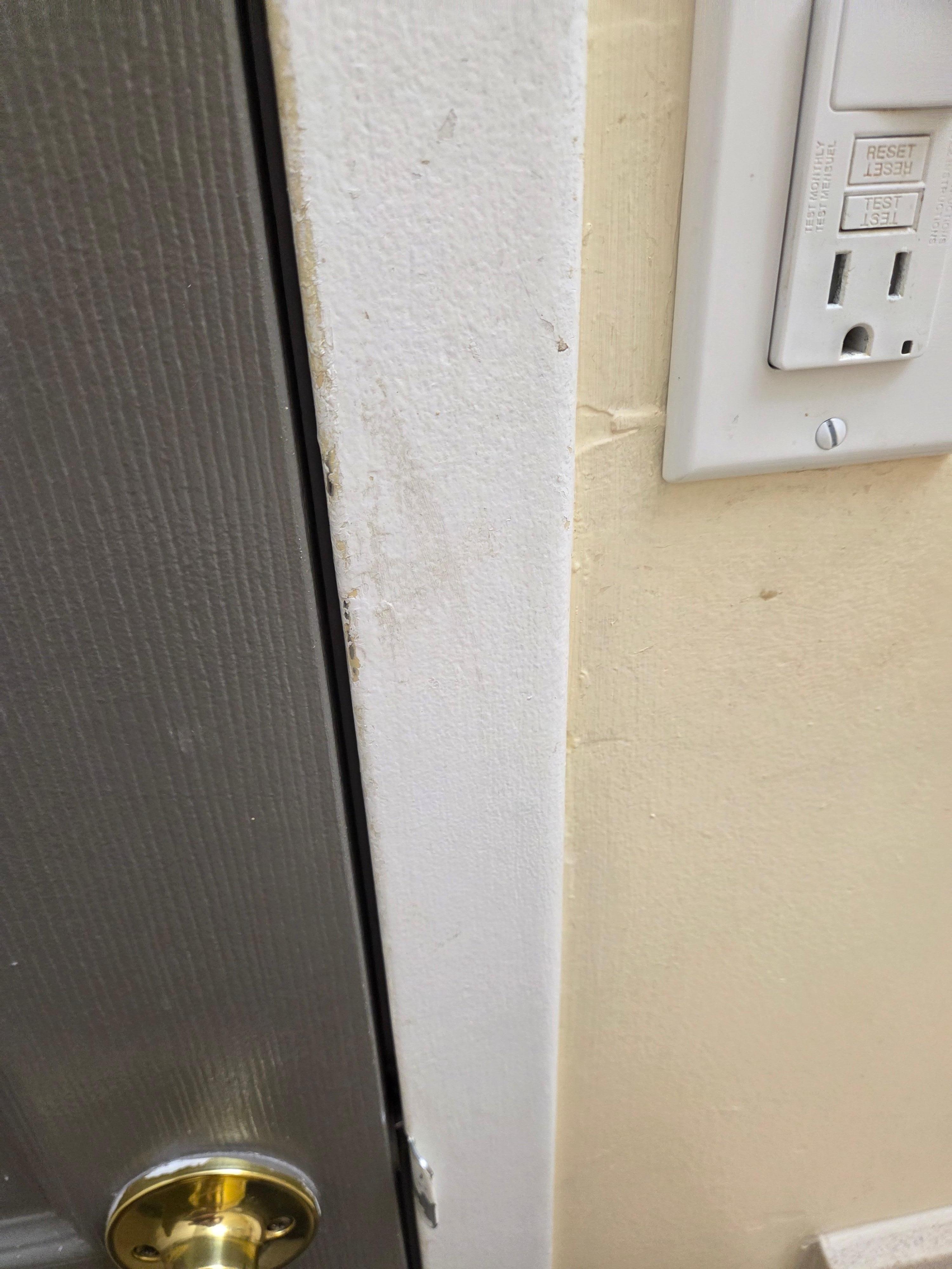 Filthy bathroom door jam