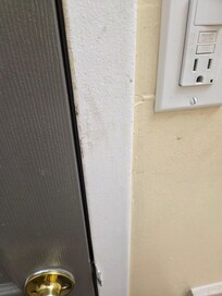 Filthy bathroom door jam