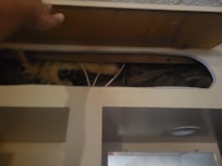 Here's the holes in the wall behind the door