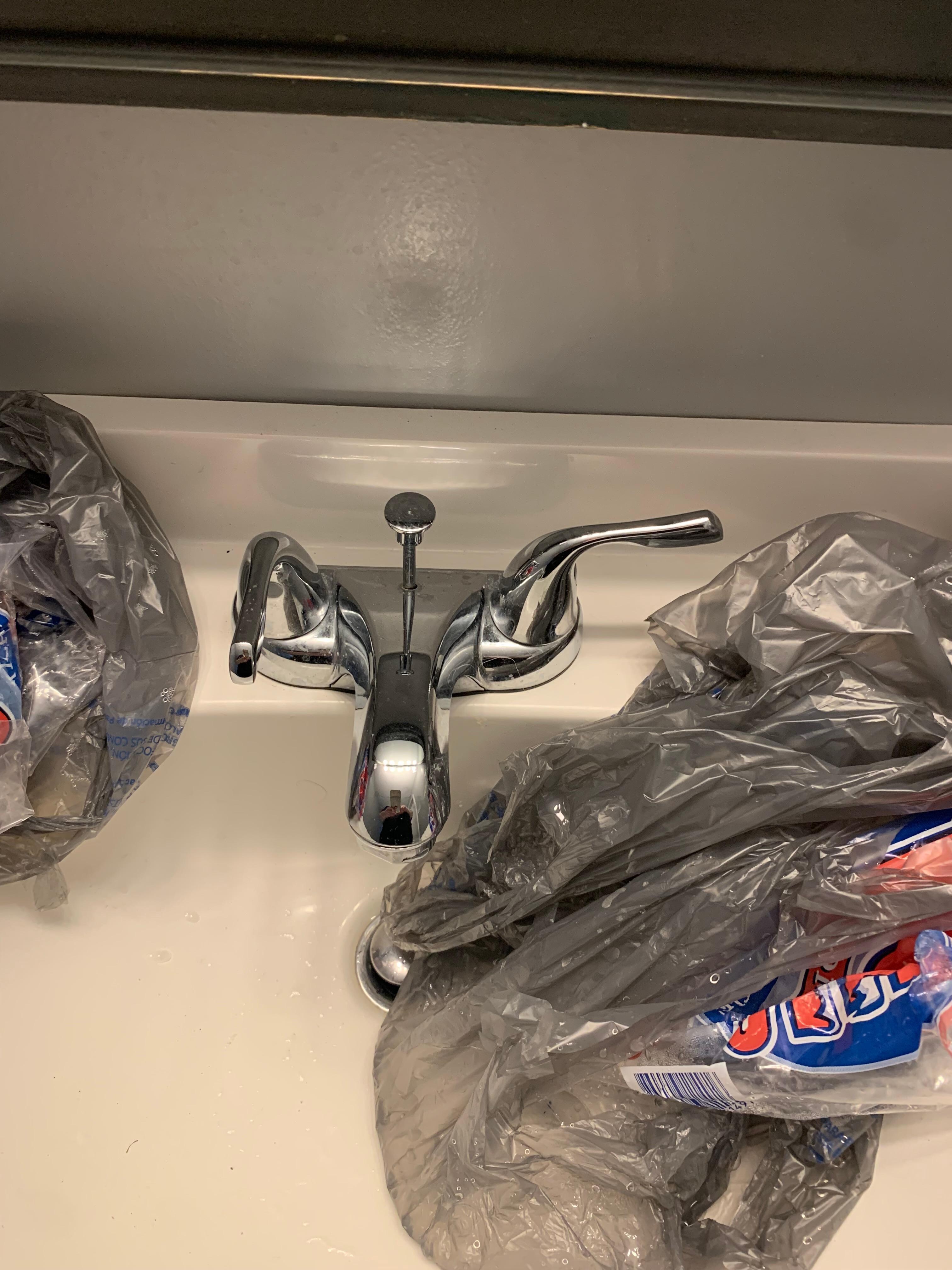 Hot water turned on, nothing coming out. Same in shower.