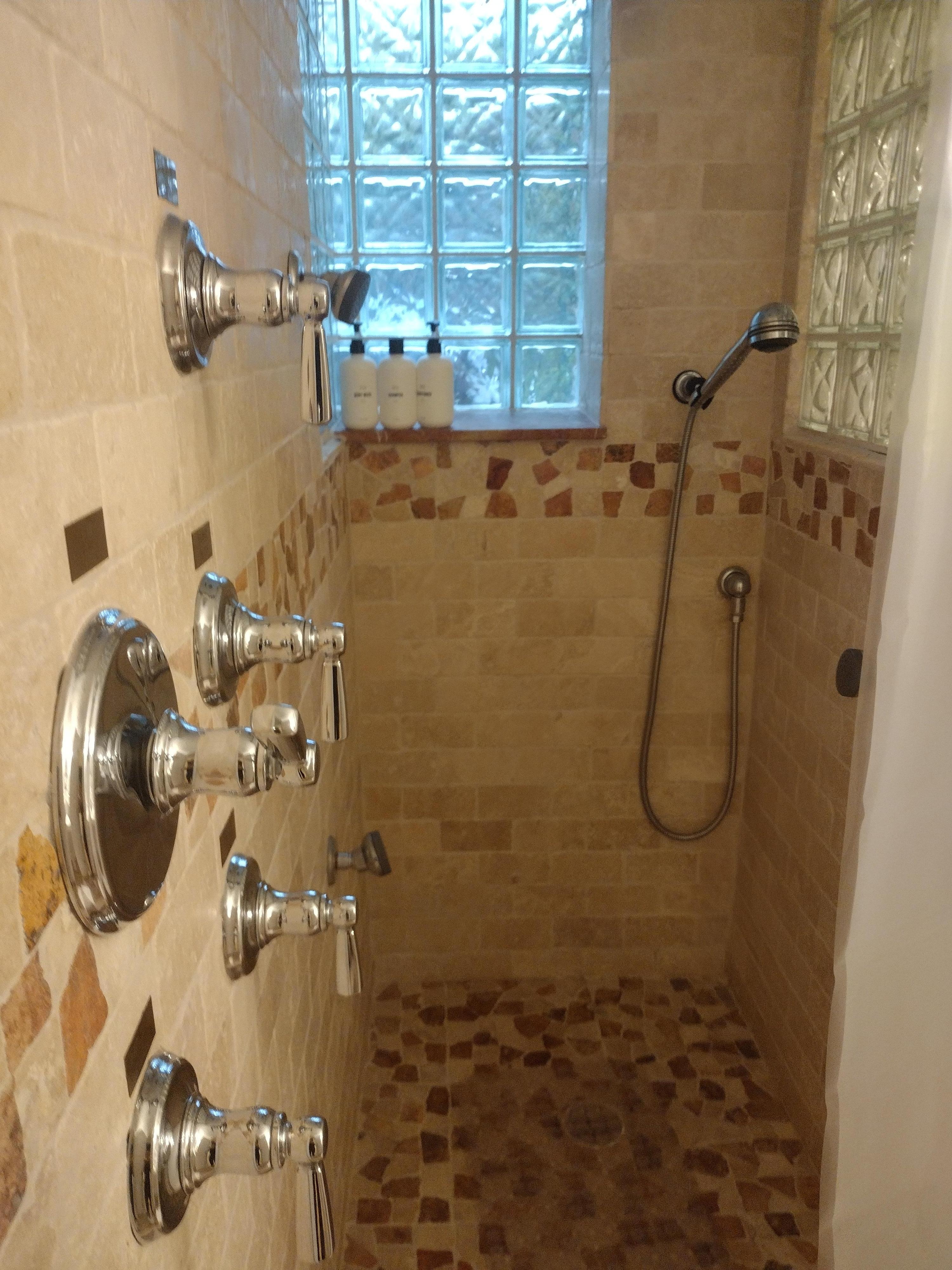 OH The side JETS! The HANDHELD! The RAINFALL shower head and even the REGULAR shower head!!  (Yes, all 4!!)  Sooo relaxing!
