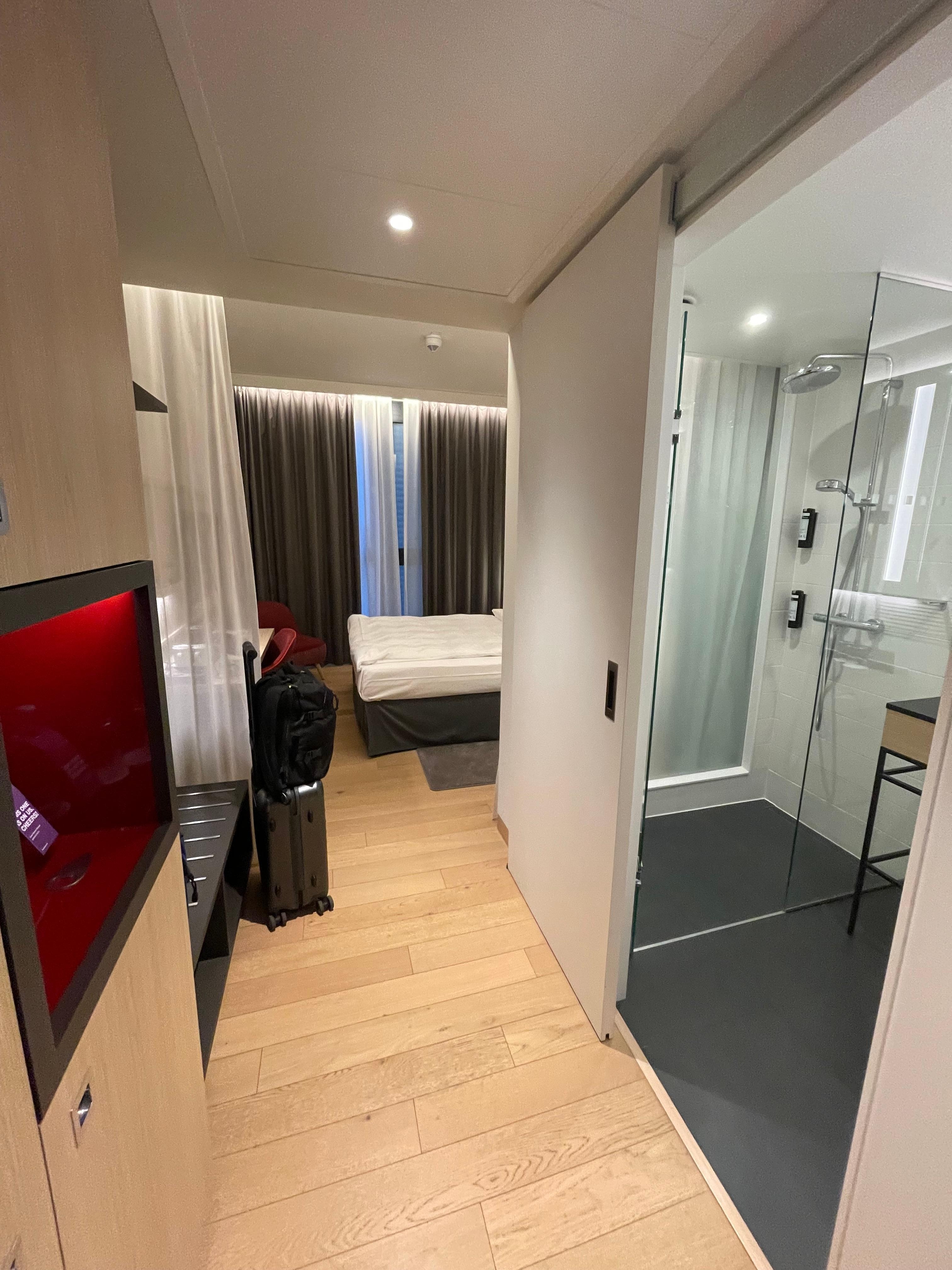 Entrance to room with queen bed 