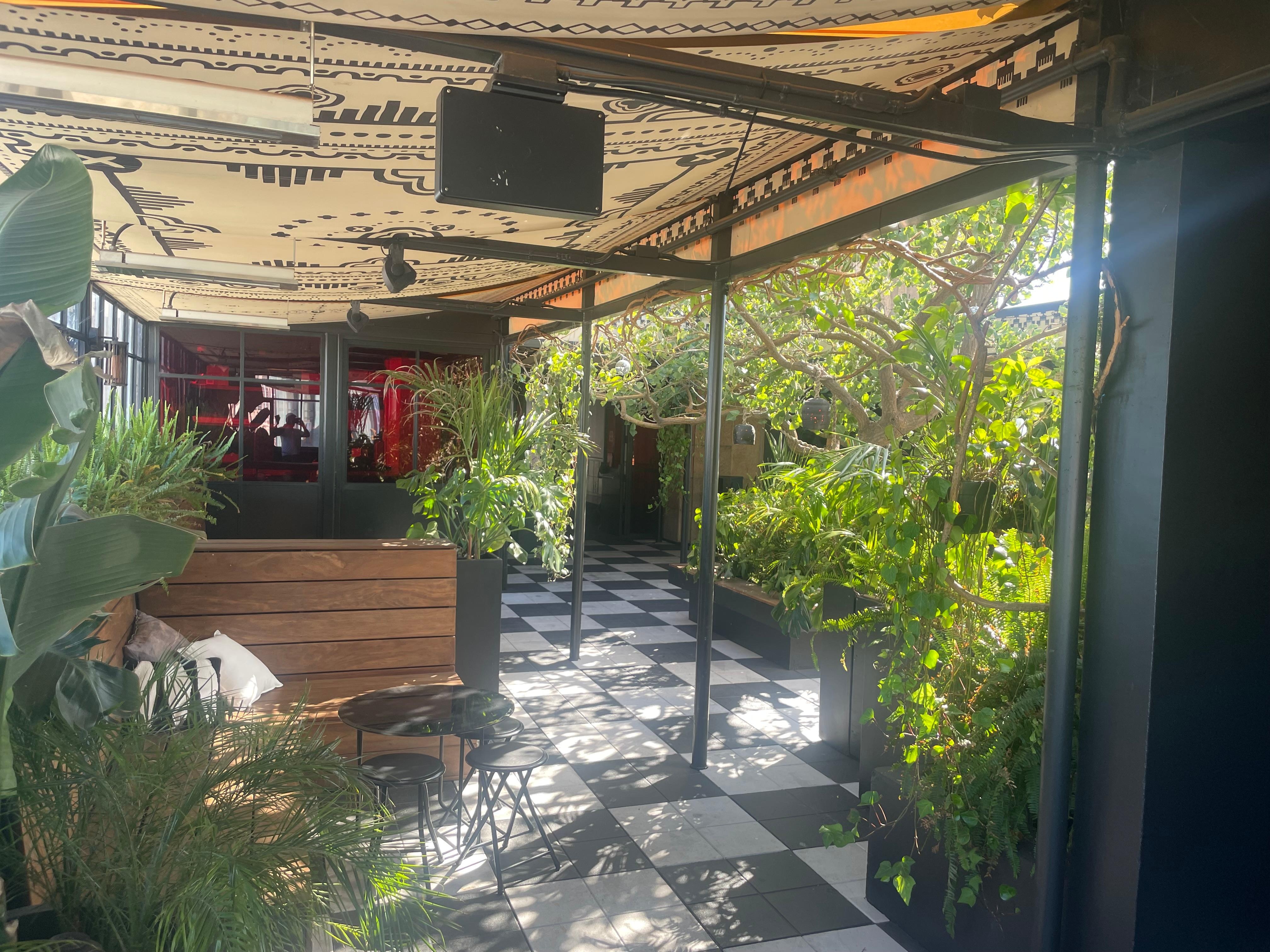Seating area at the bar on the rooftop.